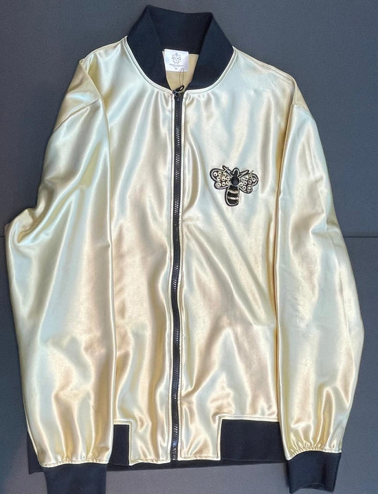 Gold satin sweatsuit with black and gold stripe